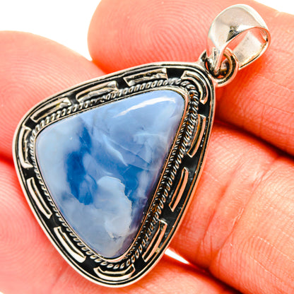 Triangular blue opal pendant in ornate 925 sterling silver bezel with loop bail