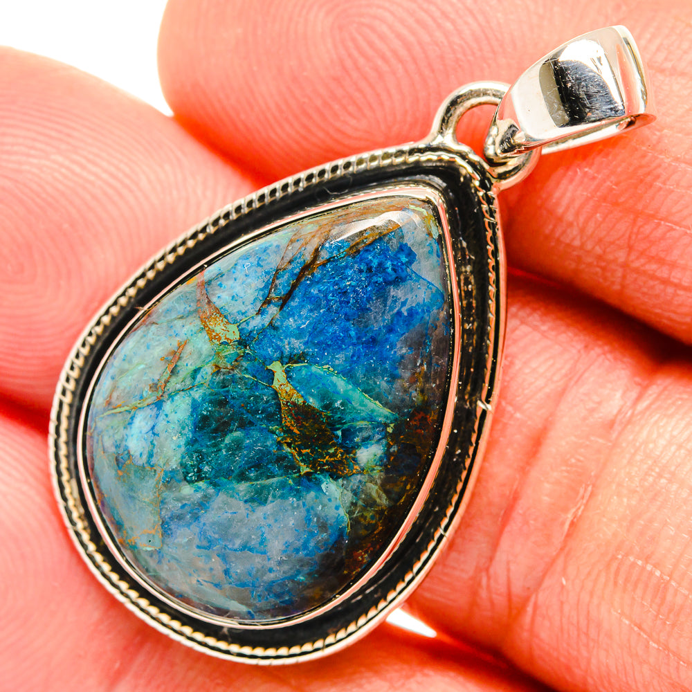 Apatite pendant in teardrop sterling silver bezel with blue-green stone and metal bail loop