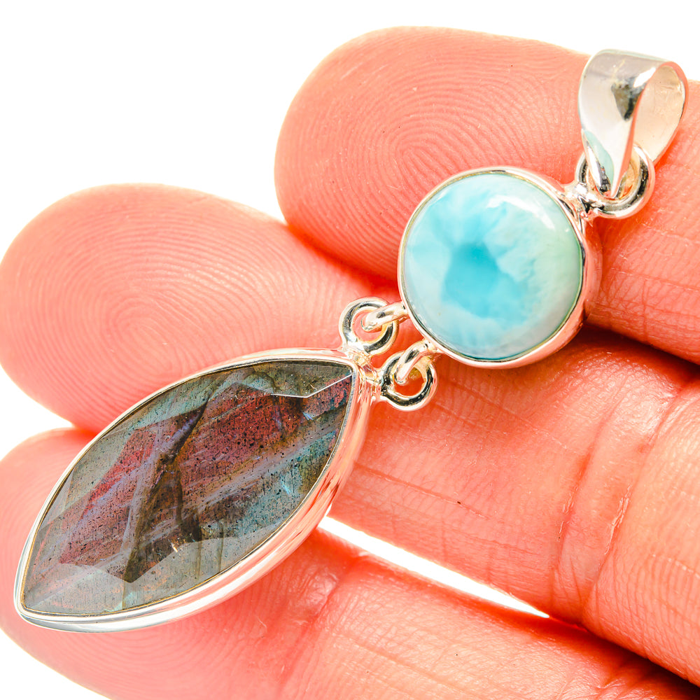 Sterling silver pendant with oval blue larimar and elongated multicolor stone detail