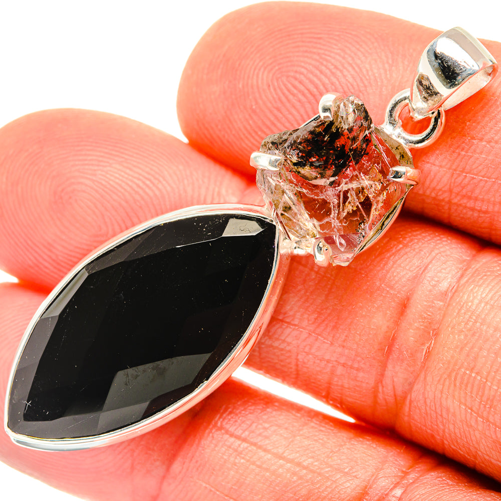 Sterling silver pendant with black onyx teardrop and rough clear herkimer diamond crystal