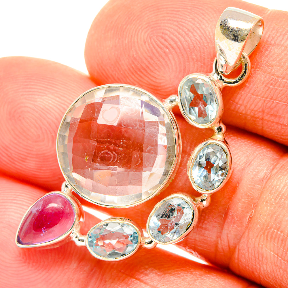 Sterling silver pendant with round white quartz and blue topaz, plus amethyst drop accents