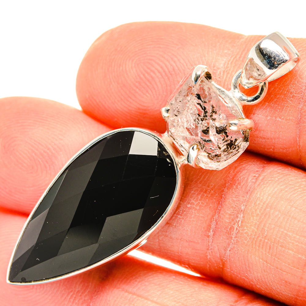 Sterling silver pendant with faceted black onyx teardrop and clear herkimer diamond cluster