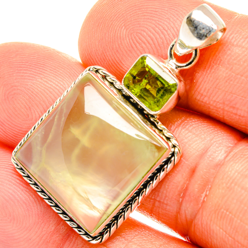 Square opalescent pendant with green peridot accents, framed in braided 925 silver.