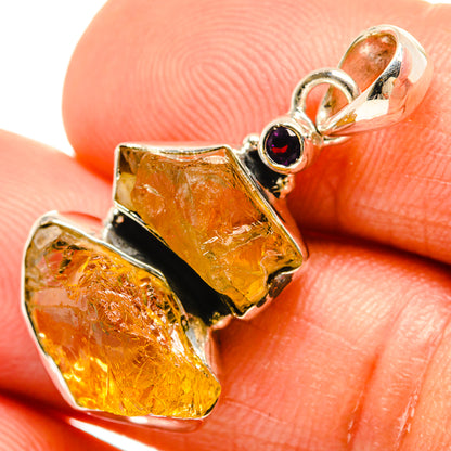 Rough citrine pendant with small dark gemstone accent, 925 sterling silver setting
