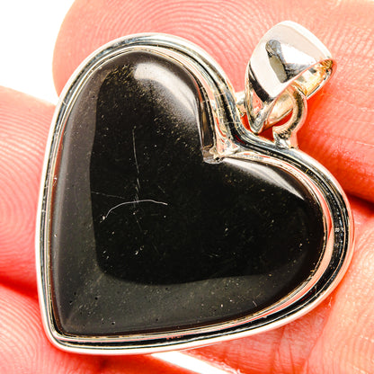Black onyx heart pendant in 925 sterling silver with polished frame and bail.