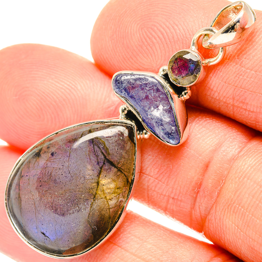 Close-up labradorite teardrop and blue-purple tanzanite drop pendant, 925 silver setting