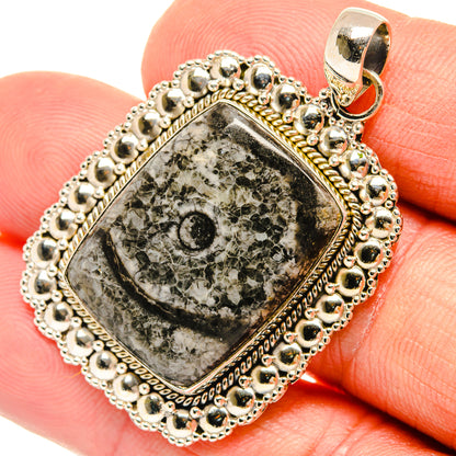 925 sterling silver pendant with rectangular goniatite fossil stone and ornate beaded frame