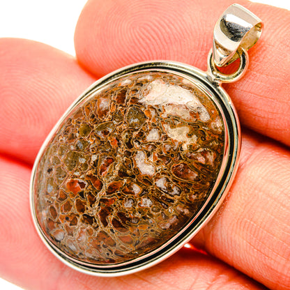 925 sterling silver dinosaur bone pendant with oval cabochon, brown and tan veining