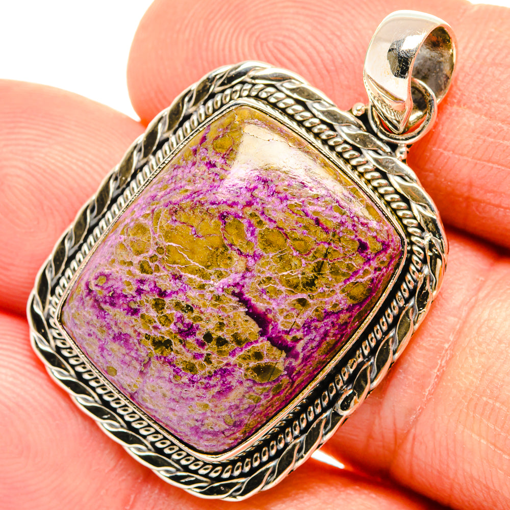 Stichtite pendant with rhombus stone, purple speckles, and detailed silver frame