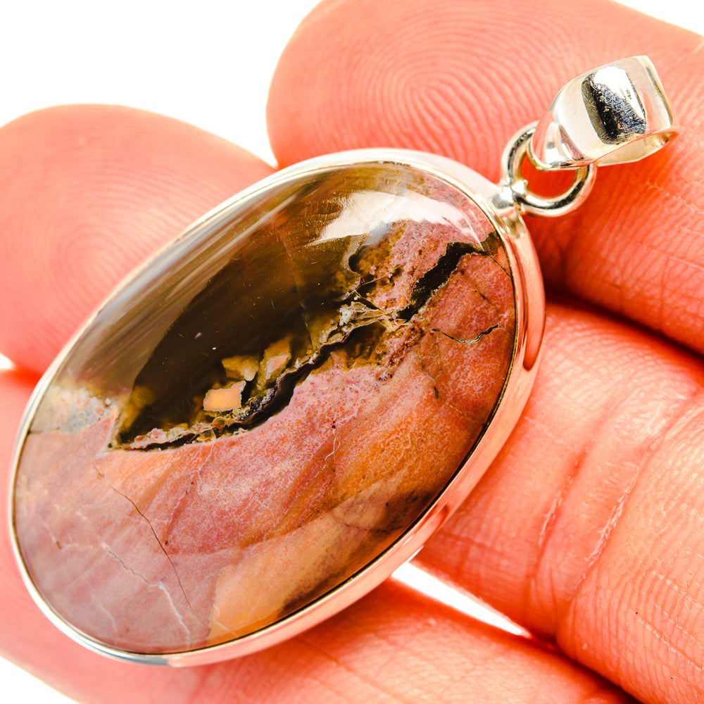 Oval jasper cabochon pendant, 925 sterling silver frame and bail; red-orange with dark streaks