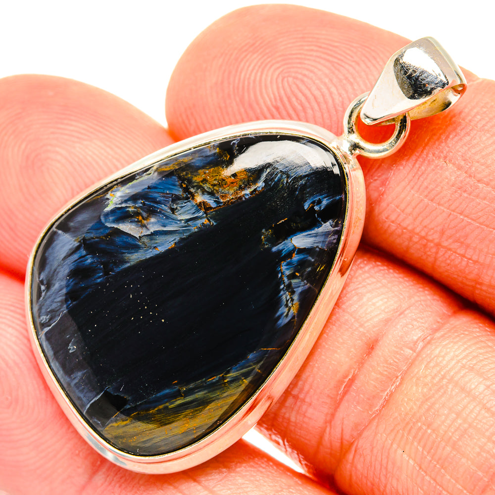 Teardrop pietersite pendant with blue-black stone and gold flecks, sterling silver frame