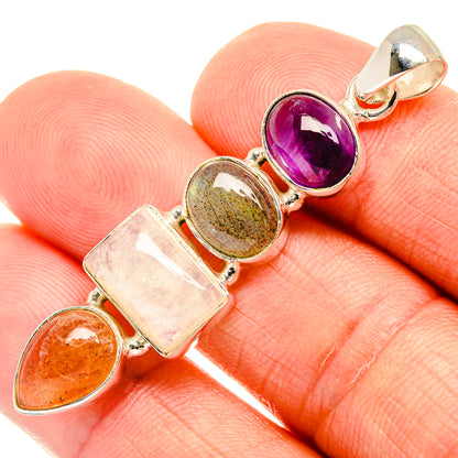 Sterling silver pendant with amethyst oval, green round, clear rectangle, orange drop