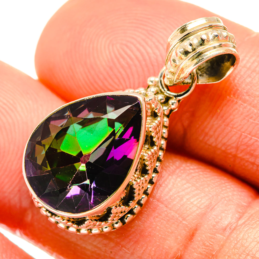 925 sterling silver teardrop pendant close-up with green and purple faceted gemstone