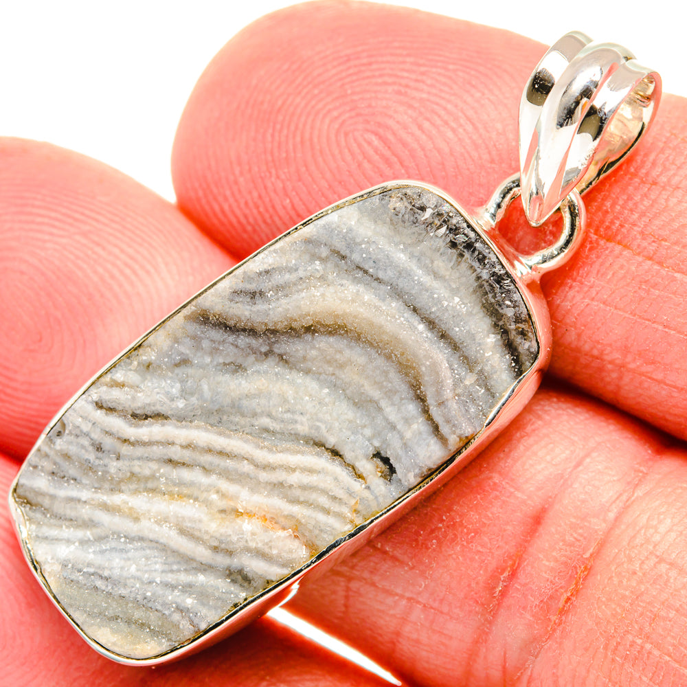 Rectangular banded desert druzy pendant in sterling silver bezel with loop bail