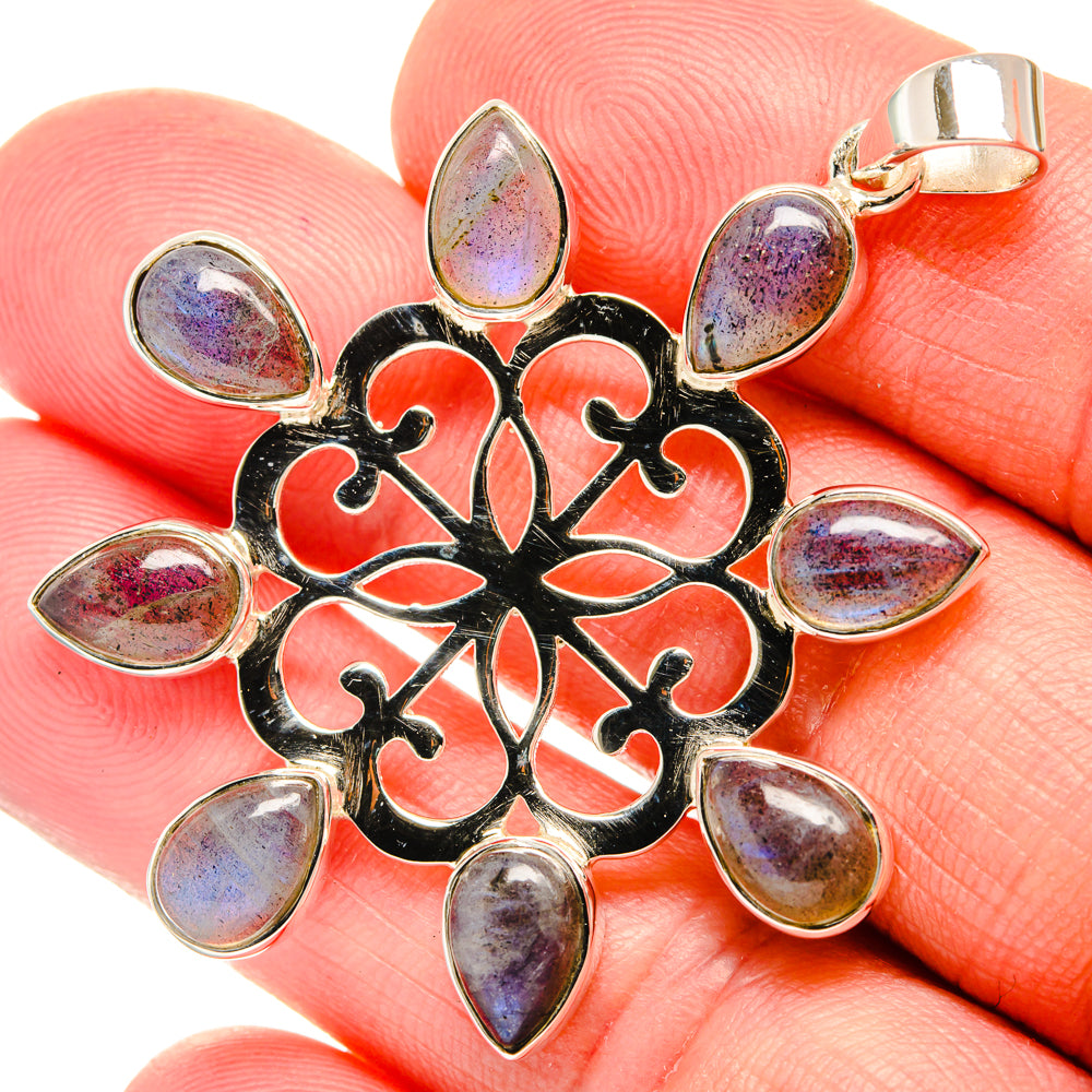 Sterling silver labradorite pendant with black filigree and eight teardrop stones