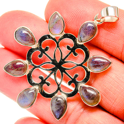 Sterling silver labradorite pendant with black filigree and eight teardrop stones