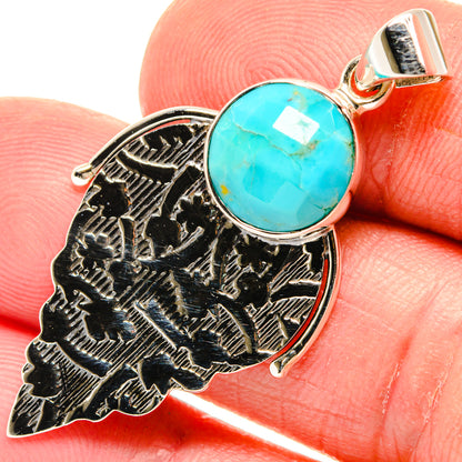 Chrysocolla pendant close-up: round turquoise stone in ornate 925 silver frame with bail