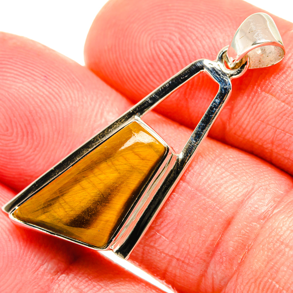Amber tiger eye pendant in 925 sterling silver with loop bail detail