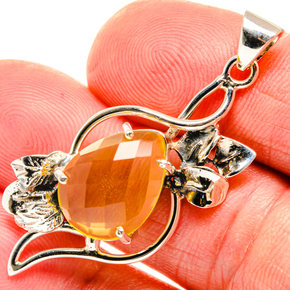 Oval orange citrine pendant in 925 sterling silver, with floral side accents