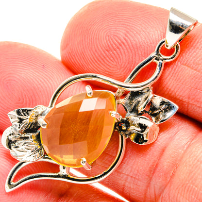Oval orange citrine pendant in 925 sterling silver, with floral side accents