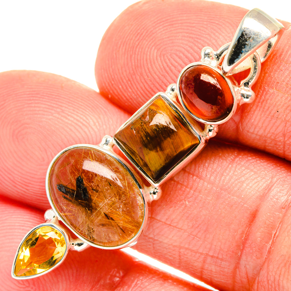 Sterling silver pendant with oval amber and brown stones, red cabochon, yellow teardrop