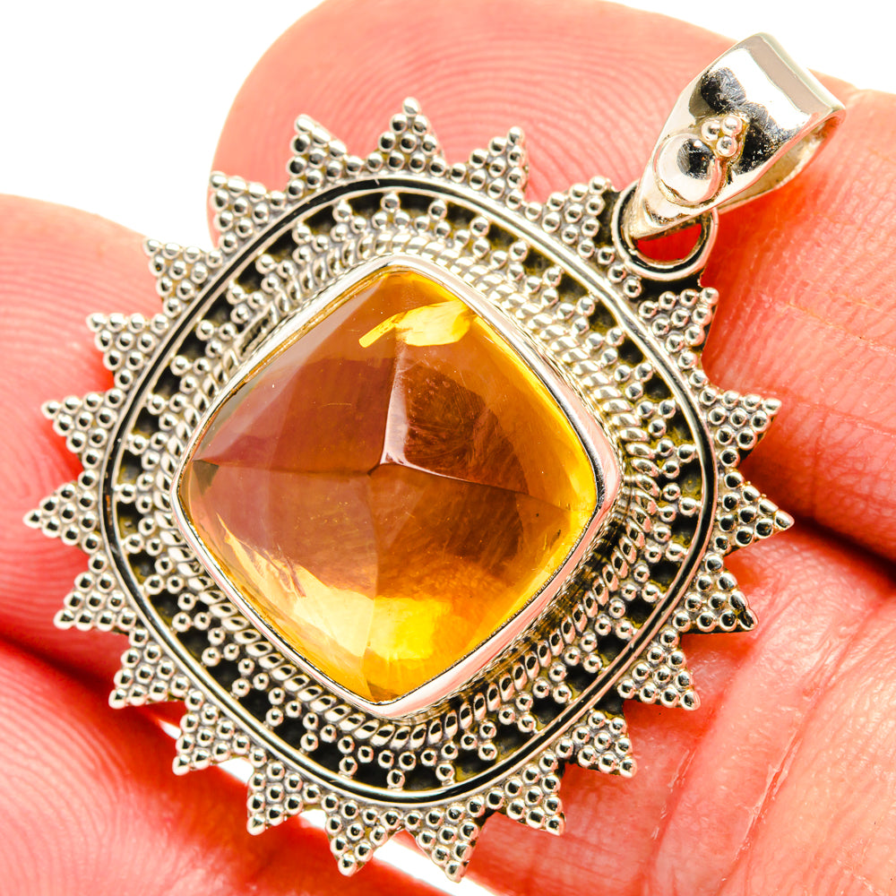 Natural citrine sugarloaf pendant, faceted yellow stone in ornate 925 silver frame