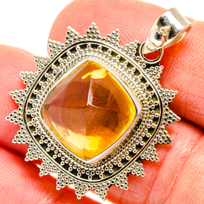 Natural citrine sugarloaf pendant, faceted yellow stone in ornate 925 silver frame