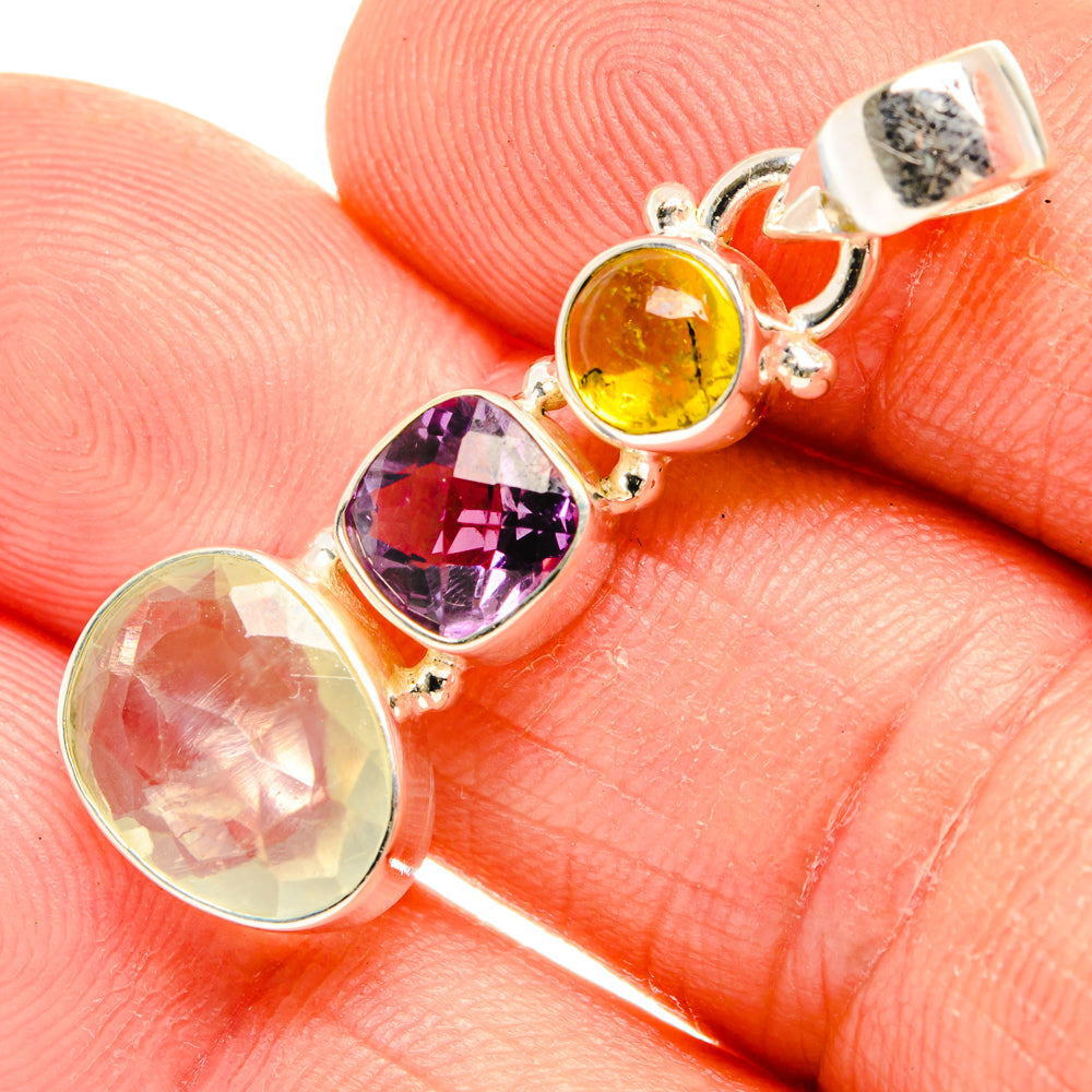 Round gemstone pendant in sterling silver with yellow, amethyst purple, and pale green stones