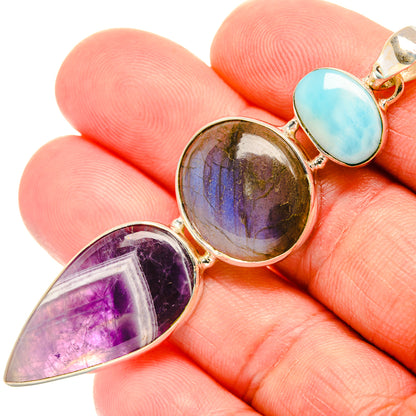 925 sterling silver pendant with oval Larimar, round Labradorite, and teardrop Amethyst stones