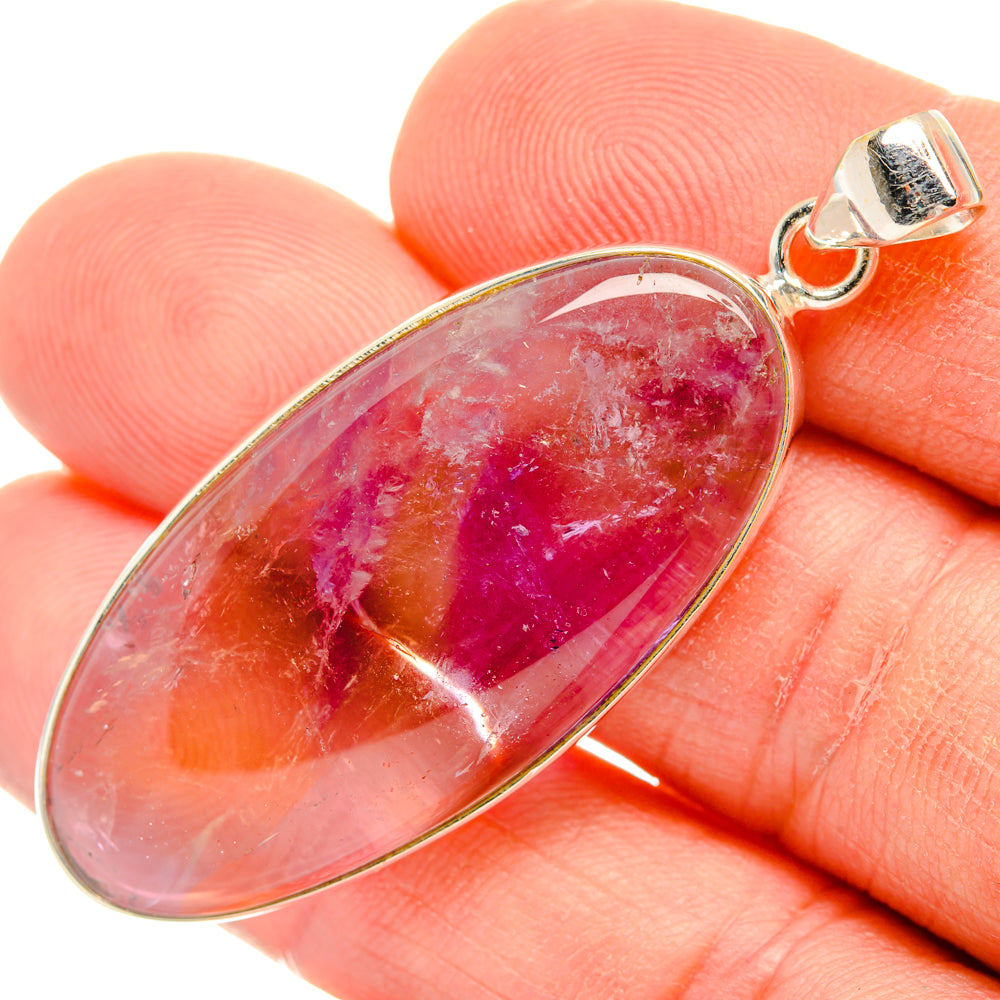 Oval ametrine cabochon pendant in sterling silver setting with loop bail