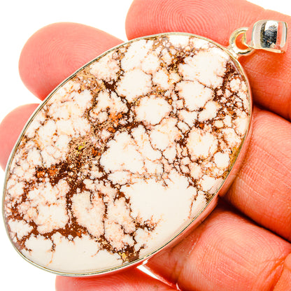 Wild horse jasper pendant oval cabochon with marbled brown-and-cream stone and silver frame