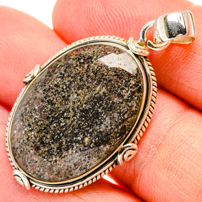Oval speckled tourmalinated quartz pendant with round rope bezel and 925 sterling bail
