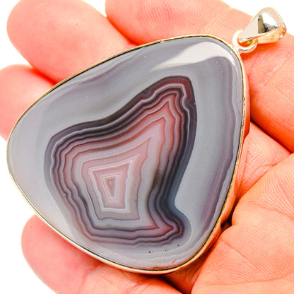 Botswana agate pendant, teardrop banded in purple-gray and red, set in 925 sterling silver