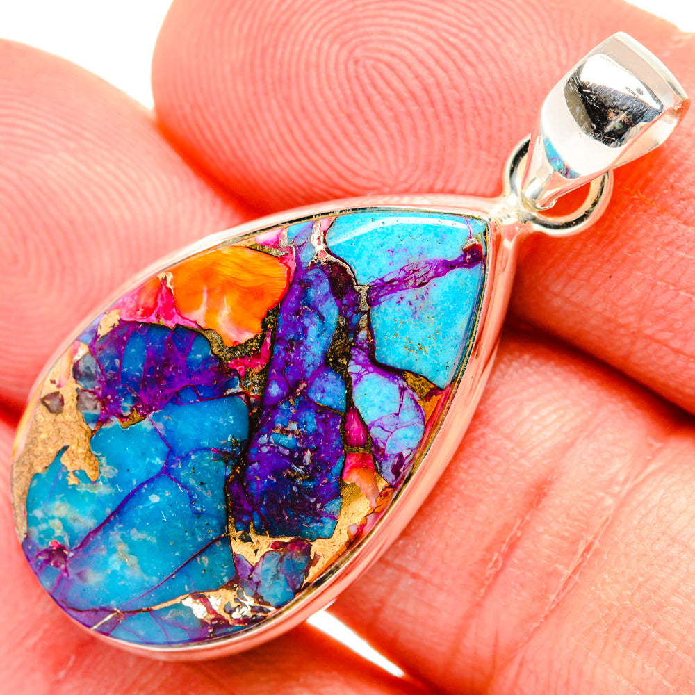 Oval turquoise-and-pink mosaic pendant with sterling silver bail, close-up detail