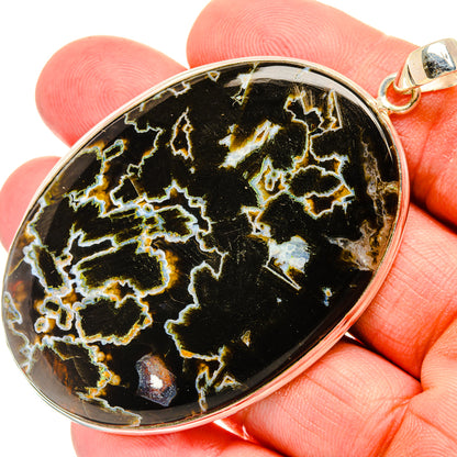 Sterling silver agate pendant, black with gold and white veining, top loop