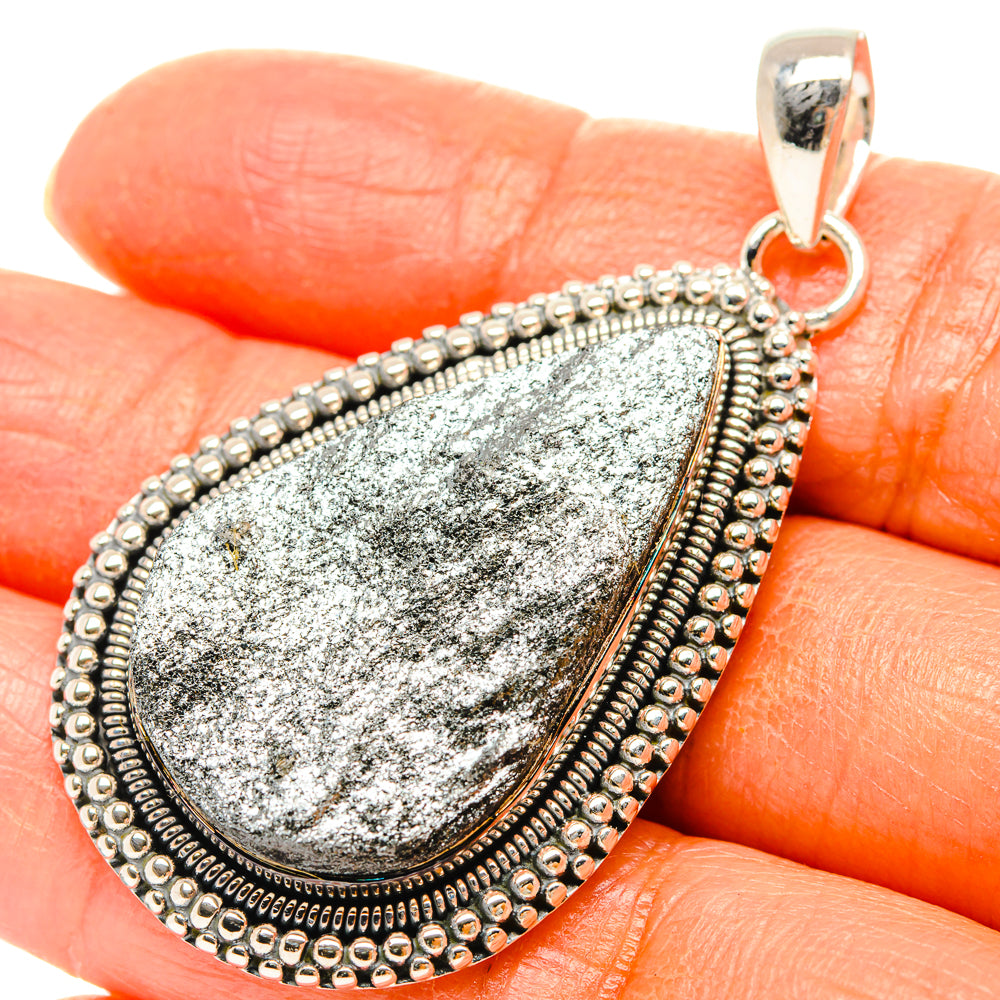 Sterling silver teardrop pendant with rough gray galena stone, beaded frame and bail
