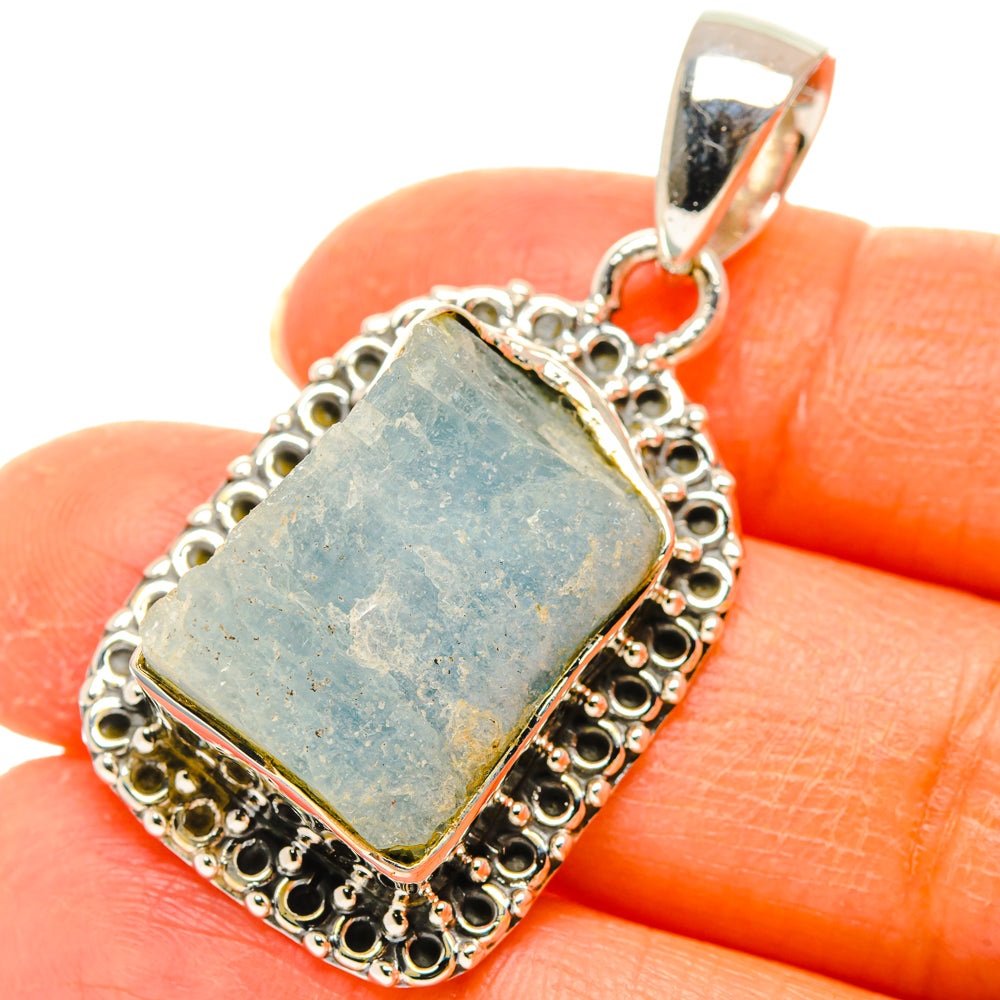 Rough aquamarine rectangle pendant in ornate 925 sterling silver setting with bail
