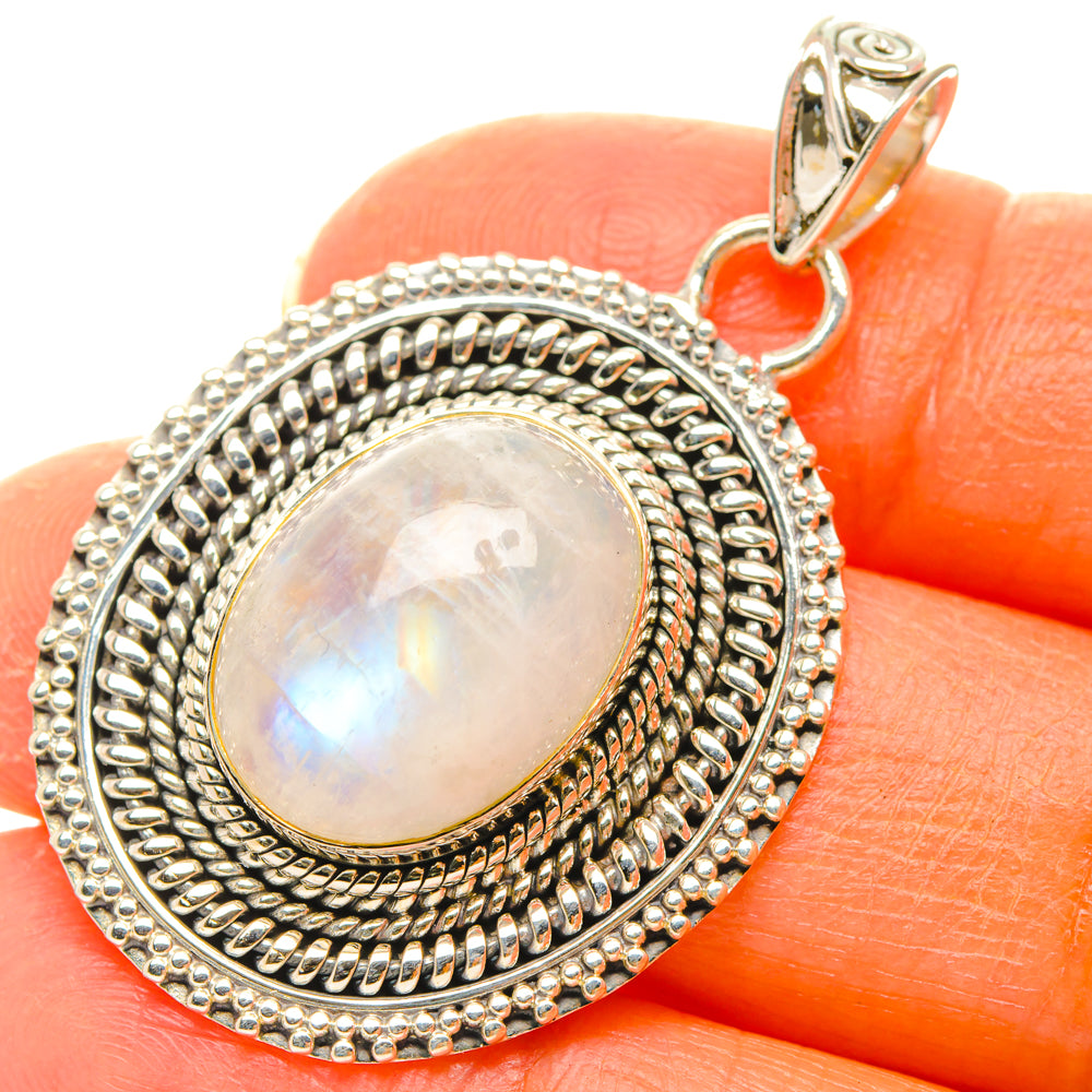 Oval moonstone pendant in 925 sterling silver with beaded border and loop bail