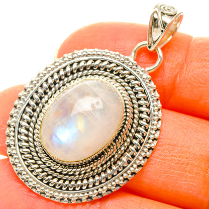 Oval moonstone pendant in 925 sterling silver with beaded border and loop bail