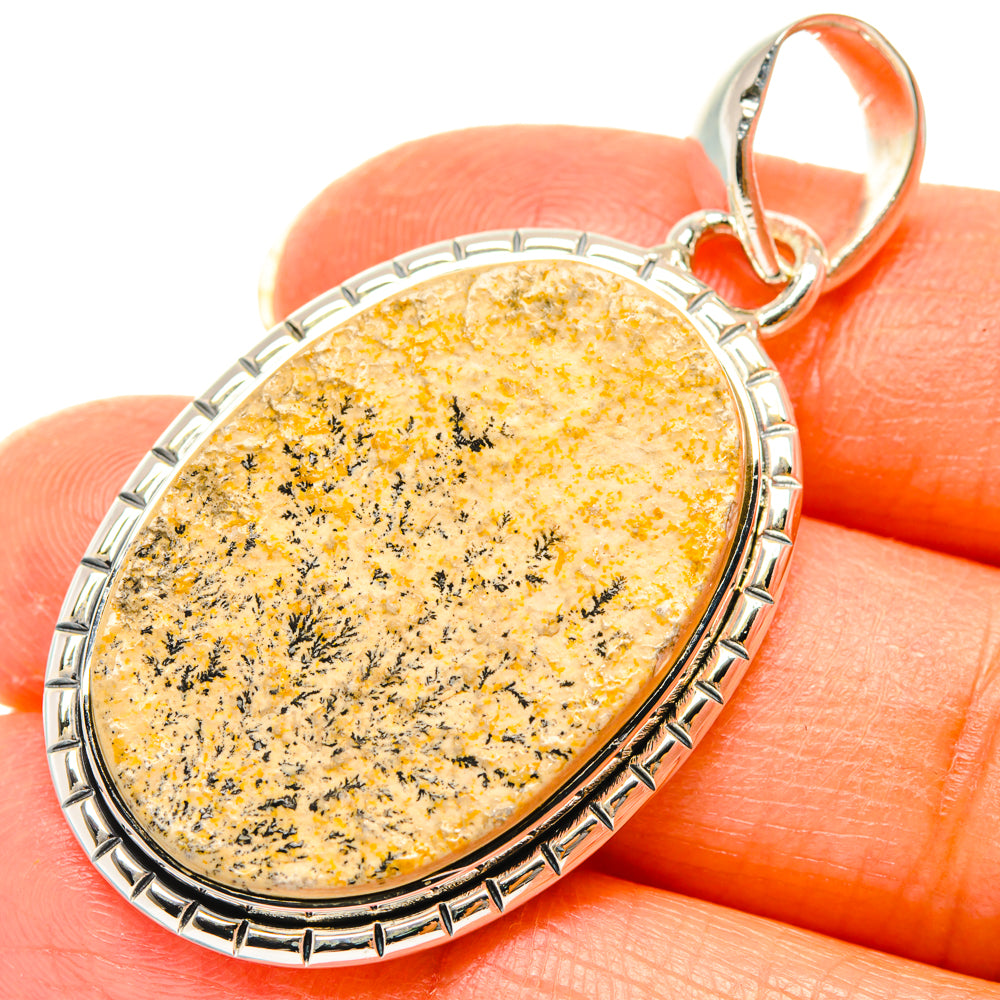 Sterling silver oval dendrite pendant, yellow with black needle-like inclusions, orange bail