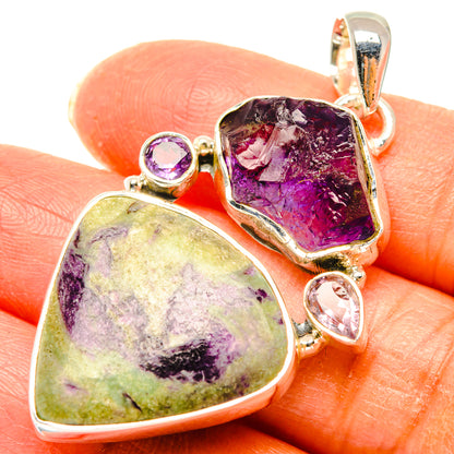 Sterling silver pendant with raw amethyst and oval pale green stone, bezel-set