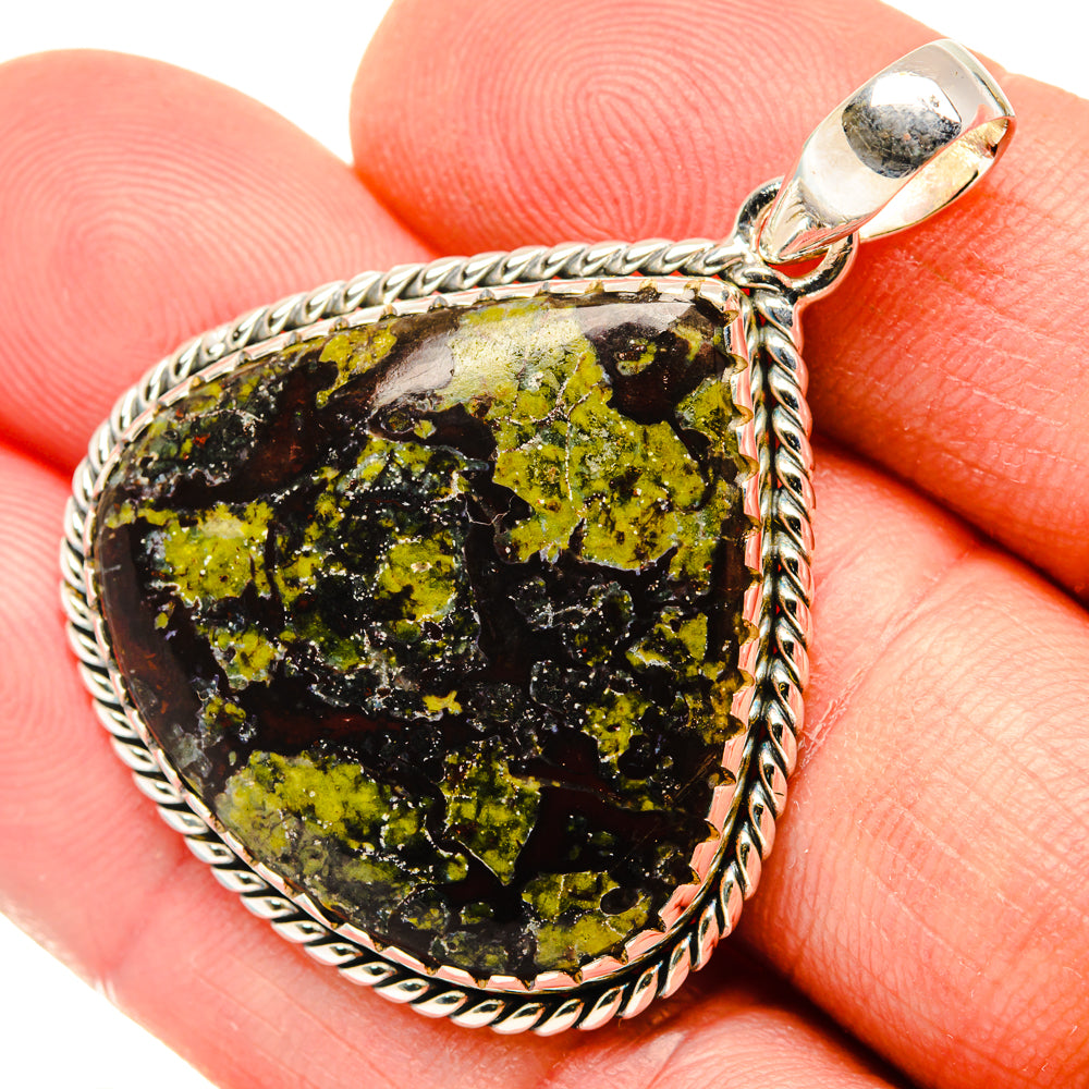 925 sterling silver pendant with dark green stone and yellow speckled texture