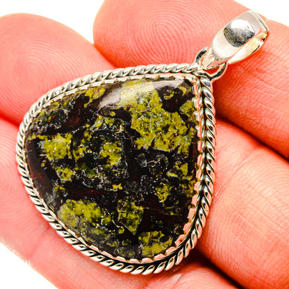 925 sterling silver pendant with dark green stone and yellow speckled texture