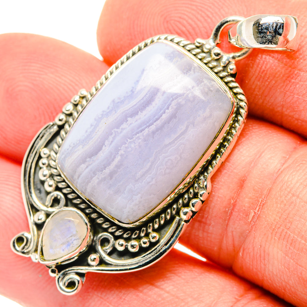 925 sterling silver lace agate pendant with teardrop accent stones and oval frame