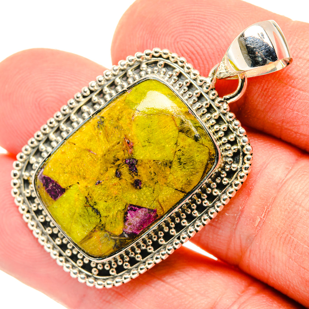 925 sterling silver atlantisite pendant with yellow gemstone and purple flecks, bail visible