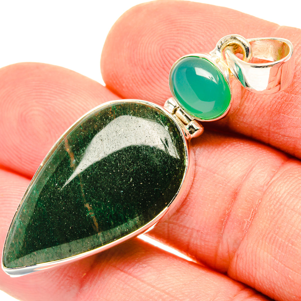 Green teardrop pendant with round top stone in a silver bezel setting