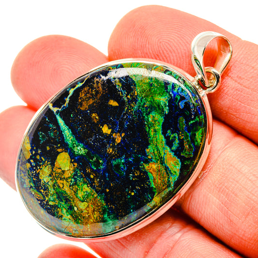 Sterling silver stone pendant with teardrop oval bezel, blue-green and yellow patterns