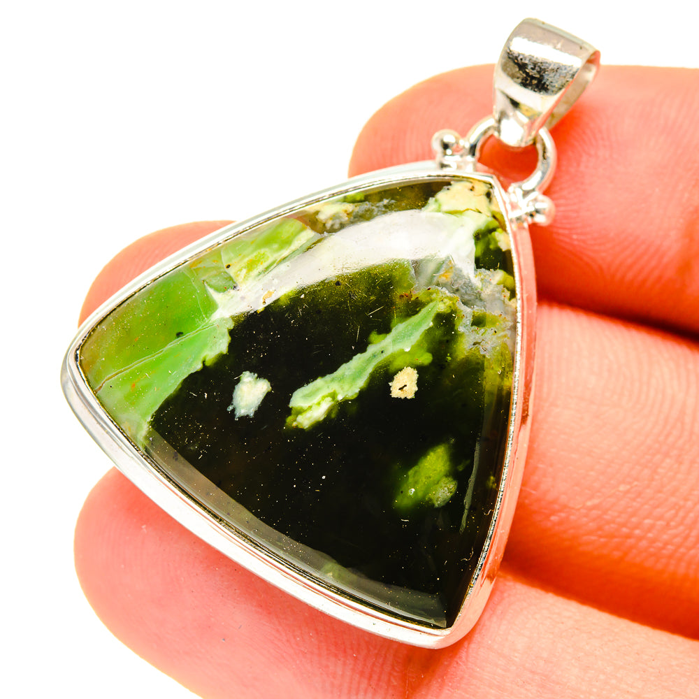 Green and black opal triangle pendant with silver bail and polished edge