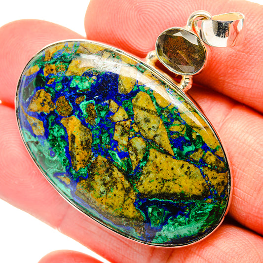 Oval gemstone pendant in 925 sterling silver, green blue yellow stone with silver bezel