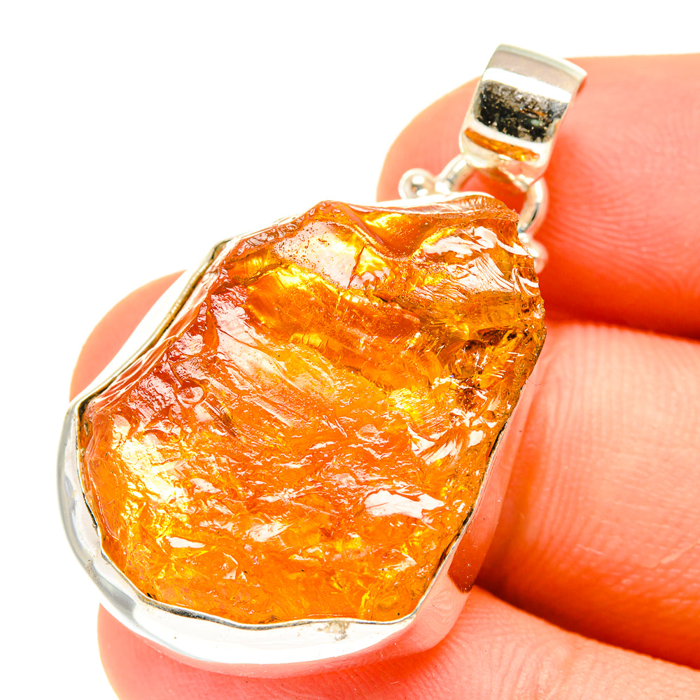 Rough citrine pendant, 925 sterling silver prong setting around amber textured stone